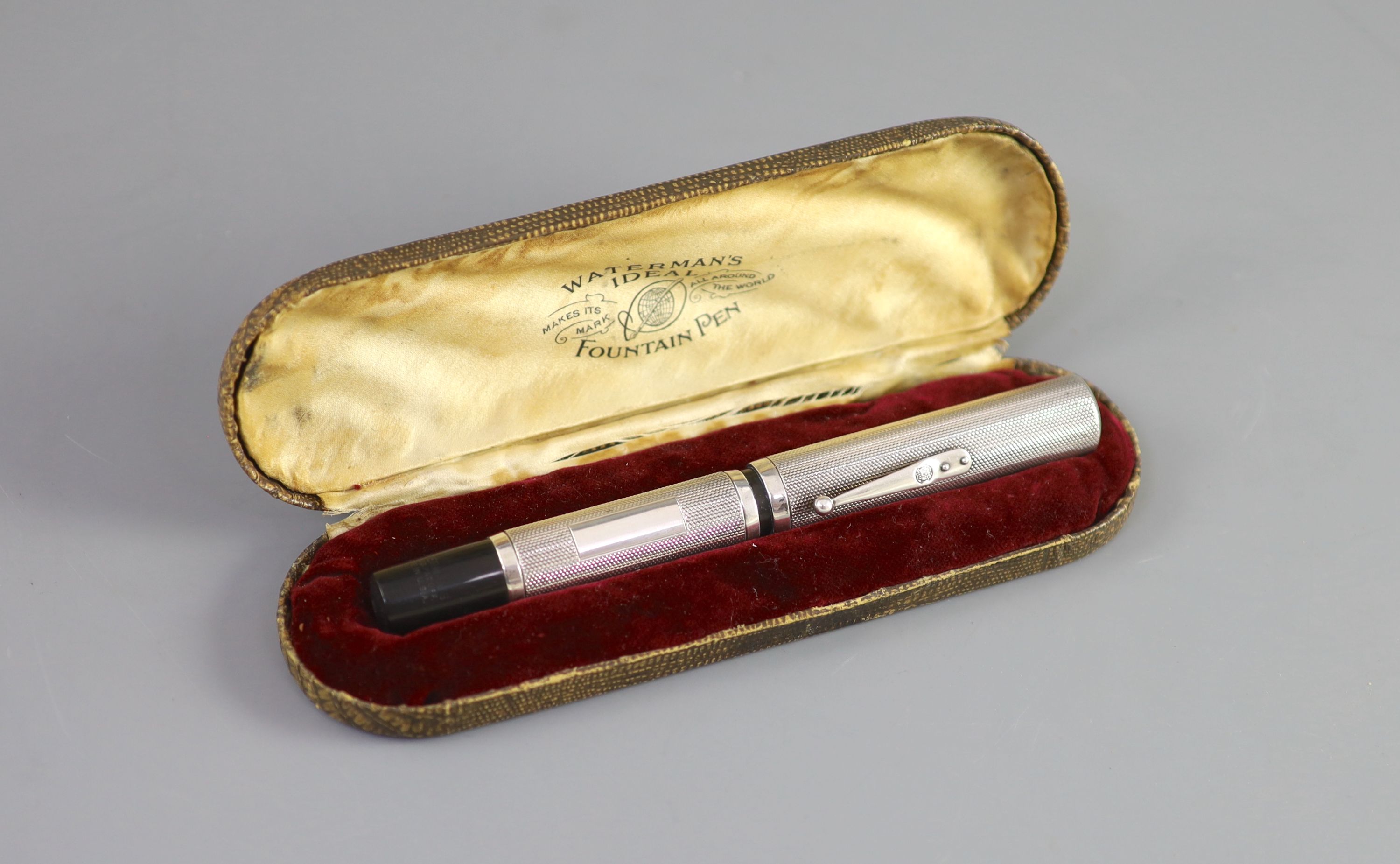 A rare giant Waterman's 58 Ideal silver overlaid fountain pen, 15.2 cm, Waterman’s case